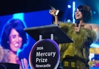 UK singer-songwriter Raye wins Mercury Prize for second album
