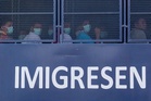 Immigration busts illegal foreign worker network at car seat factory