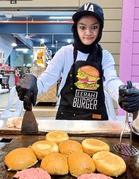 Anwar extends support to disabled burger seller whose determination inspires Malaysians