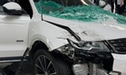 SUV crashes into KKIA departure hall entrance, female driver injured
