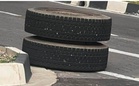 ‘Flying’ lorry tyre smashes front of Axia waiting at traffic light (video)