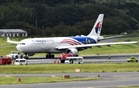 Malaysia Airlines plane aborts take-off after black smoke seen at Narita Airport