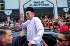 Anwar apologises over TuJu glitches, blames delays on app improvements