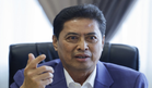 Azam Baki denies threat allegations after giving statement to police