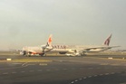 Jetstar plane makes emergency stop after near-miss with Qatar Airways aircraft