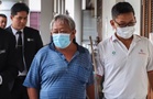 Two men charged over dragging dog behind motorcycle in Penang