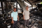 Grandfather risks life to save nine family members as fire destroys home