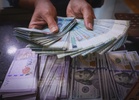 Ringgit slips v US dollar on BOJ interest rate hike