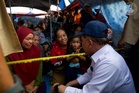 Gantian dokumen percuma, bantuan pendidikan RM300 untuk mangsa kebakaran Sandakan