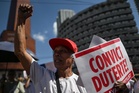 ICC rules Philippine ex-president Duterte must stand trial for murder