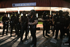Philippine president calls emergency meeting after chaos, shooting at Senate