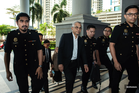 Senior finance figure among two charged with CBT involving over RM10m