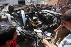 Israeli strikes in Gaza kill three, testing fragile ceasefire