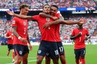 Bellingham shines as England sink Panama to top group