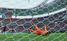 Baena strike sends Spain past Uruguay into World Cup knockouts