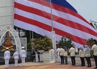 Jalur Gemilang diperiksa teliti sebelum dikibar di tiang tertinggi Asia Tenggara