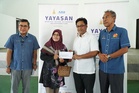 43 keluarga mangsa ribut Kampung Delek terima bantuan Yayasan MBI