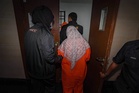 Calls grow for Syariah-compliant attire for Muslim women in detention