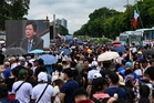 Thousands from Philippine sect protest pro-Duterte senator's looming arrest