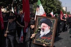 Crowds bid farewell to Khamenei in Iranian holy city of Qom