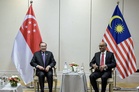Anwar pays courtesy call on Singapore president during state visit