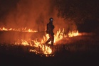 Two wildfires merge near Madrid, 19,000 evacuated or confined