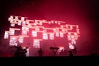 Massive Attack banned from Singapore over Palestinian flag display