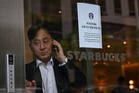 South Korea police raid Starbucks HQ over 'Tank Day' fiasco