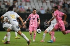 Messi scores twice on his first start since World Cup final