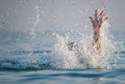 Two 14-year-old boys feared drowned while swimming in river