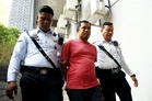 Tanker lorry driver pleads not guilty to reckless driving causing deaths of mother, son