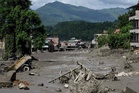 Hundreds missing after Nepal-Tibet flood kills at least 160