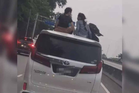 Police investigate viral video of children seen riding on moving Toyota Alphard roof