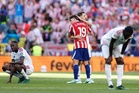 Atletico Madrid beat Real Madrid in tense derby clash