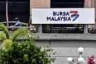 Bursa Malaysia marginally lower at mid-morning on profit-taking