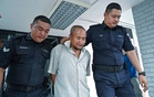 Father, son remanded to assist probe into murder of disabled woman