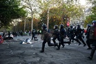 French protesters clash with police during nationwide demonstrations