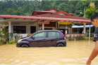 ‘Mesut Ozil’ Myvi submerged in Pangkor floods