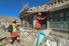 Tibet earthquake kills 16 and destroys hundreds of homes