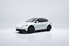 Electric cars hit record 30 per cent share of UK new car market as fuel prices give EV buyers a nudge