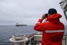 Coast Guard searching Pacific Ocean for six people after losing contact with boat during Typhoon Sinlaku