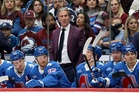 NHL coach fractures his face after being struck by a loose puck