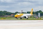 Passenger charged with sexually assaulting woman sitting next to him on flight to Australia