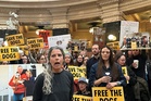 Animal welfare protesters converge on Wisconsin governor's office seeking release of beagles