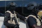 Islamic State militants kill at least 29 in an attack on a village in northeastern Nigeria