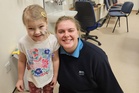 ‘Medics saved my daughter’s life after removing brain tumour. Here are the symptoms to look out for’