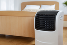 Portable vs fitted air conditioning units compared for long-term use by an expert