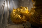 Towering golden statue of Trump unveiled at dedication ceremony