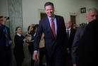 Former FBI Director James Comey surrenders over alleged threat against Trump