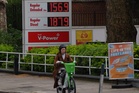 Drivers take fewer trips to cut back on fuel and adjust spending, bank suggests